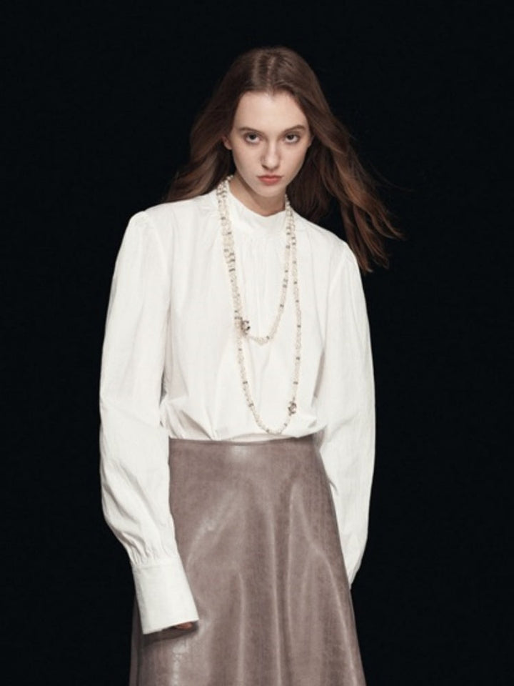 Adèle | Blouse met Hoge Hals en Subtiele Plooien