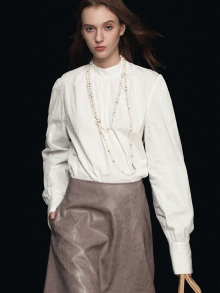 Adèle | Blouse met Hoge Hals en Subtiele Plooien